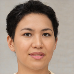 Joyful asian young-adult female with short  brown hair and brown eyes