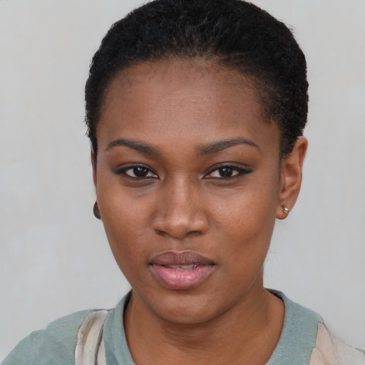 Neutral black young-adult female with short  black hair and brown eyes