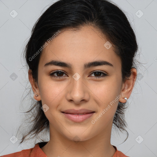 Joyful latino young-adult female with medium  brown hair and brown eyes