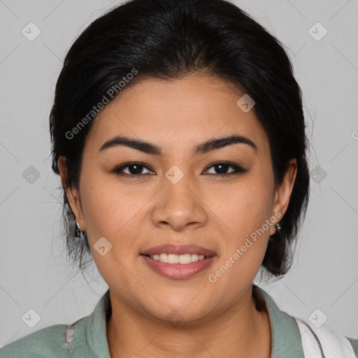 Joyful latino young-adult female with medium  brown hair and brown eyes