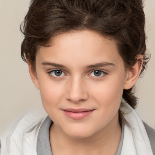 Joyful white child female with medium  brown hair and brown eyes