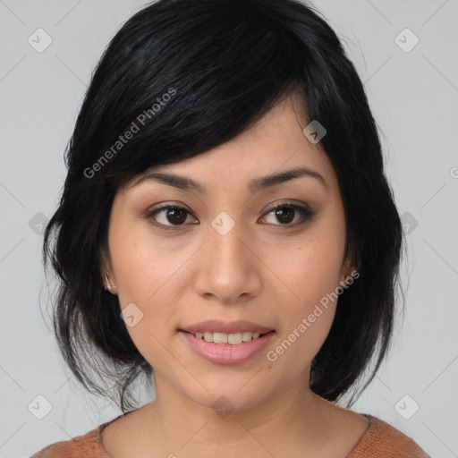 Joyful asian young-adult female with medium  black hair and brown eyes