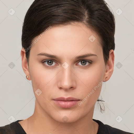 Neutral white young-adult female with medium  brown hair and brown eyes