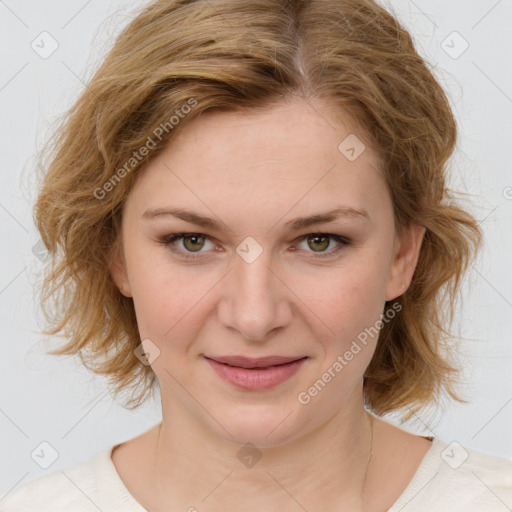 Joyful white young-adult female with medium  brown hair and green eyes