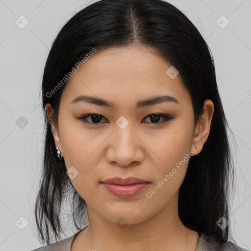 Joyful asian young-adult female with medium  black hair and brown eyes