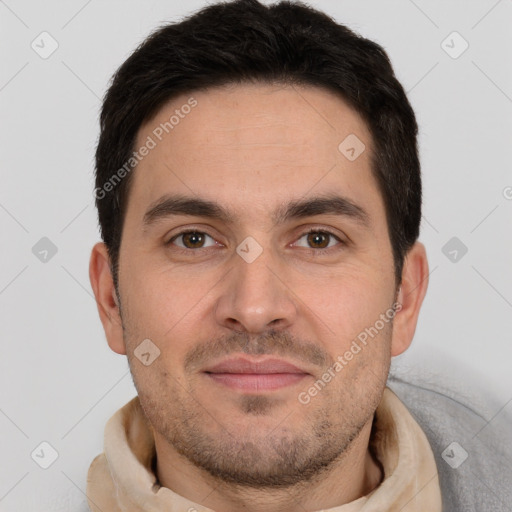 Joyful white young-adult male with short  brown hair and brown eyes