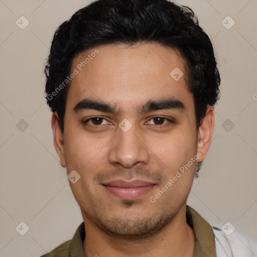 Joyful latino young-adult male with short  black hair and brown eyes