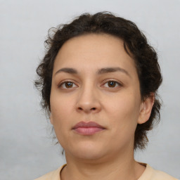 Neutral white young-adult female with short  brown hair and brown eyes