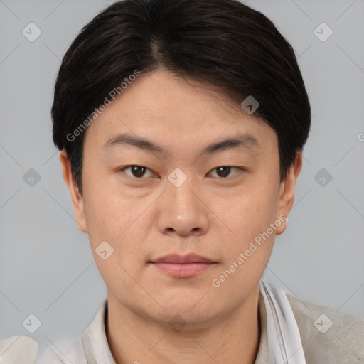 Neutral asian young-adult male with short  brown hair and brown eyes