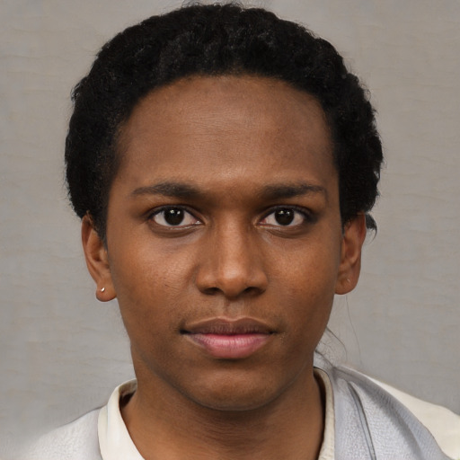 Neutral black young-adult male with short  black hair and brown eyes