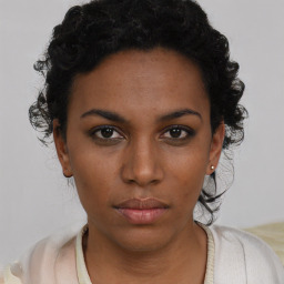 Neutral black young-adult female with short  brown hair and brown eyes