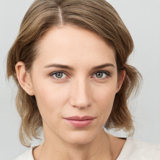 Neutral white young-adult female with medium  brown hair and grey eyes