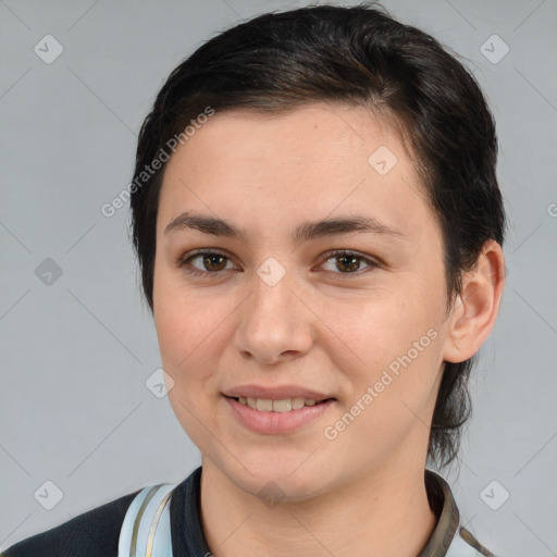 Joyful white young-adult female with medium  brown hair and brown eyes