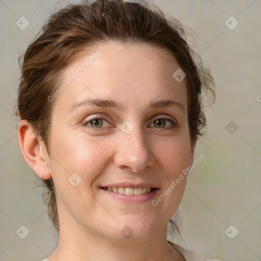 Joyful white young-adult female with medium  brown hair and green eyes