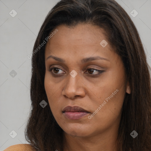 Joyful asian young-adult female with long  brown hair and brown eyes