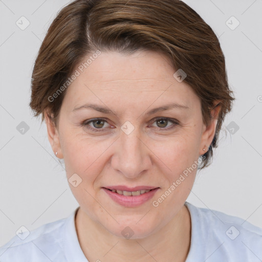 Joyful white adult female with medium  brown hair and grey eyes