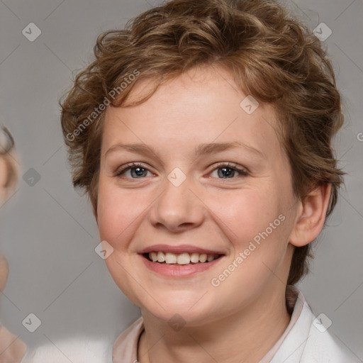 Joyful white young-adult female with medium  brown hair and blue eyes