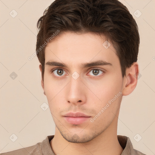 Neutral white young-adult male with short  brown hair and brown eyes