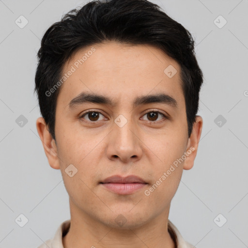 Joyful white young-adult male with short  black hair and brown eyes