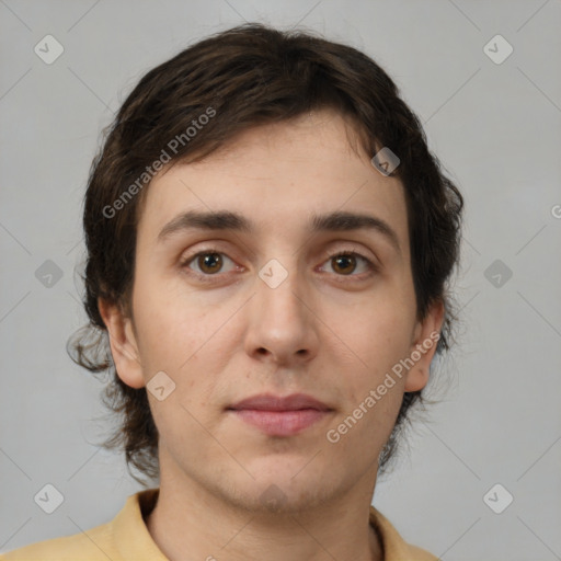 Neutral white young-adult male with medium  brown hair and brown eyes