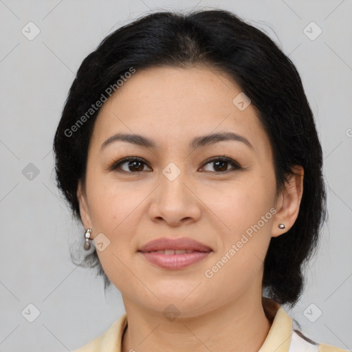 Joyful latino young-adult female with medium  brown hair and brown eyes