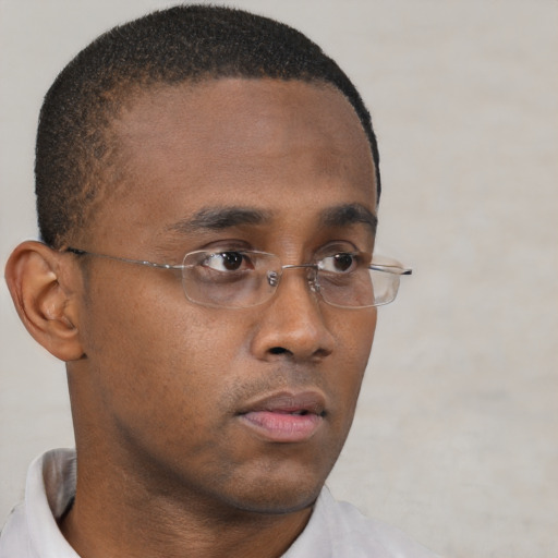 Neutral black young-adult male with short  brown hair and brown eyes