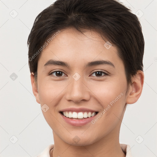 Joyful white young-adult female with short  brown hair and brown eyes