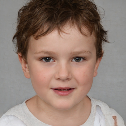 Joyful white child male with medium  brown hair and blue eyes