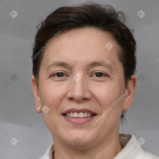 Joyful white adult female with short  brown hair and brown eyes