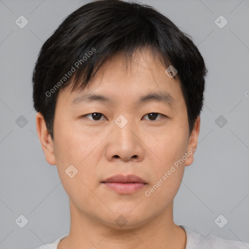 Neutral asian young-adult male with short  black hair and brown eyes