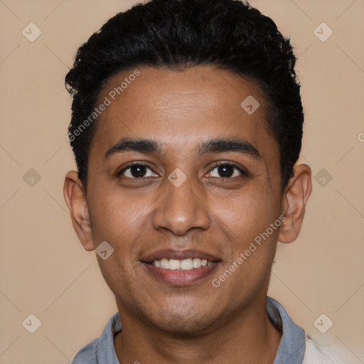 Joyful black young-adult male with short  black hair and brown eyes