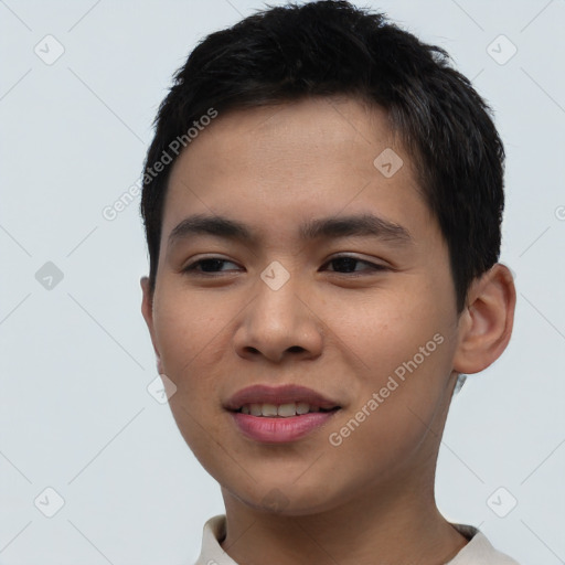 Joyful asian young-adult male with short  black hair and brown eyes