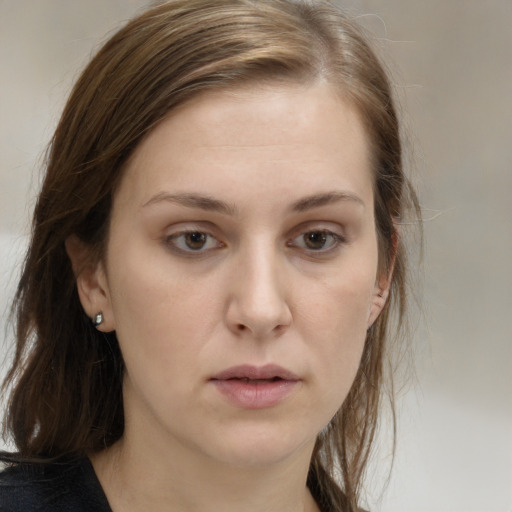 Neutral white young-adult female with medium  brown hair and grey eyes