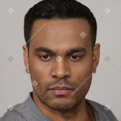 Neutral latino young-adult male with short  black hair and brown eyes