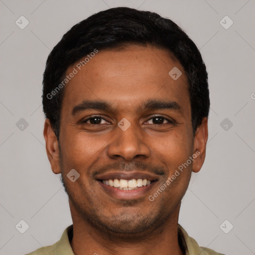 Joyful latino young-adult male with short  black hair and brown eyes