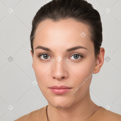 Neutral white young-adult female with short  brown hair and brown eyes