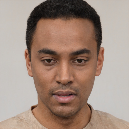 Neutral latino young-adult male with short  black hair and brown eyes