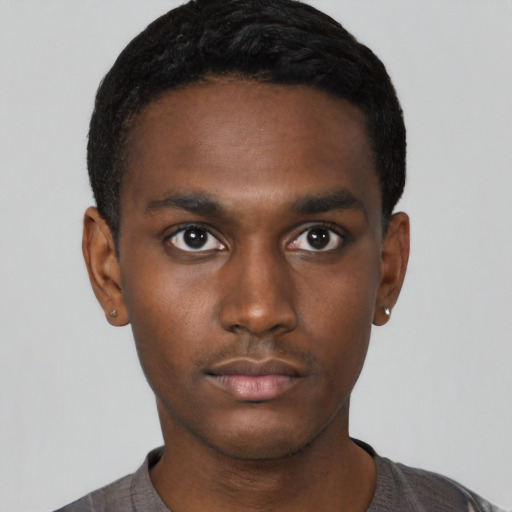 Neutral black young-adult male with short  black hair and brown eyes