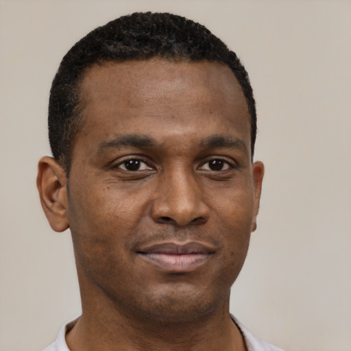 Neutral black young-adult male with short  brown hair and brown eyes