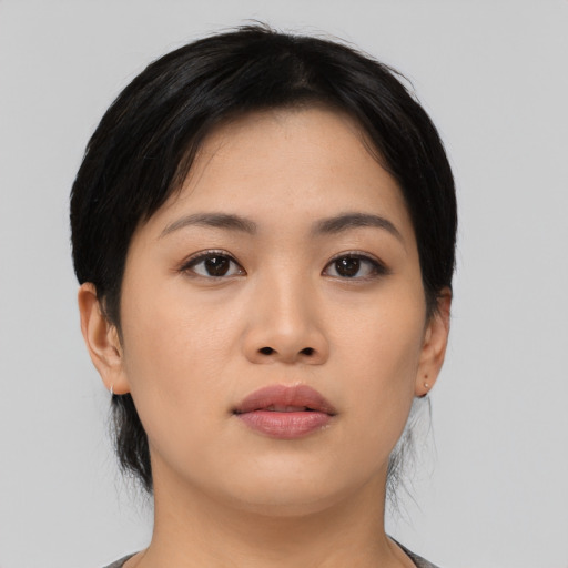 Neutral asian young-adult female with medium  black hair and brown eyes