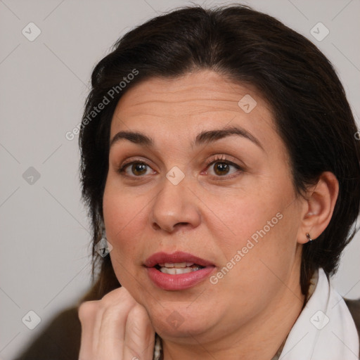 Joyful white adult female with medium  brown hair and brown eyes