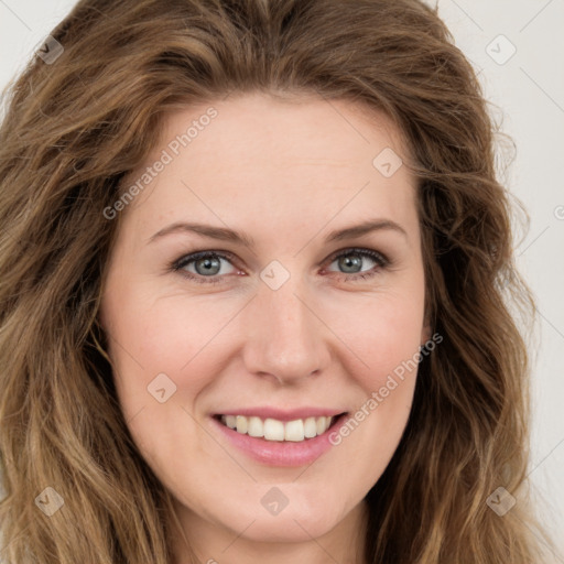 Joyful white young-adult female with long  brown hair and green eyes