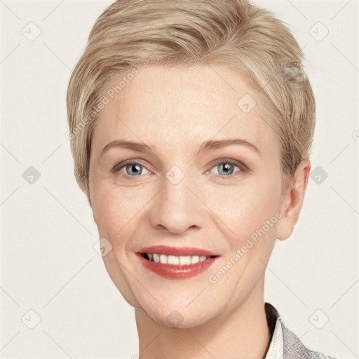 Joyful white young-adult female with short  brown hair and blue eyes