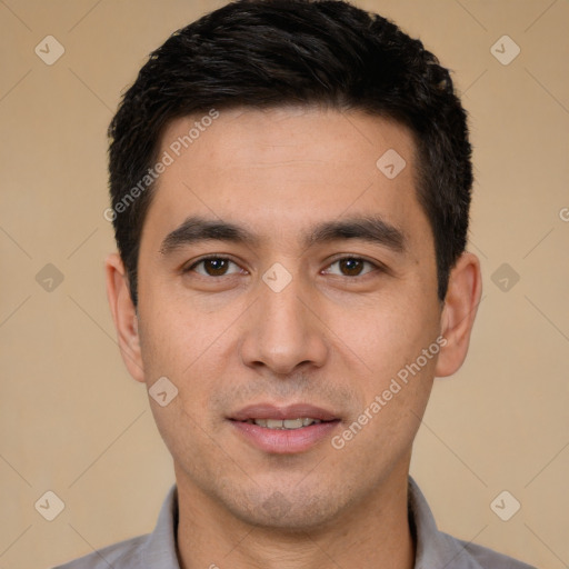 Joyful white young-adult male with short  black hair and brown eyes