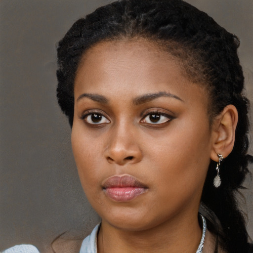 Neutral black young-adult female with long  black hair and brown eyes
