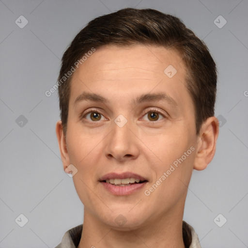 Joyful white adult female with short  brown hair and brown eyes