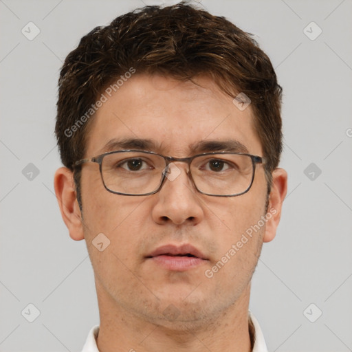 Neutral white adult male with short  brown hair and brown eyes