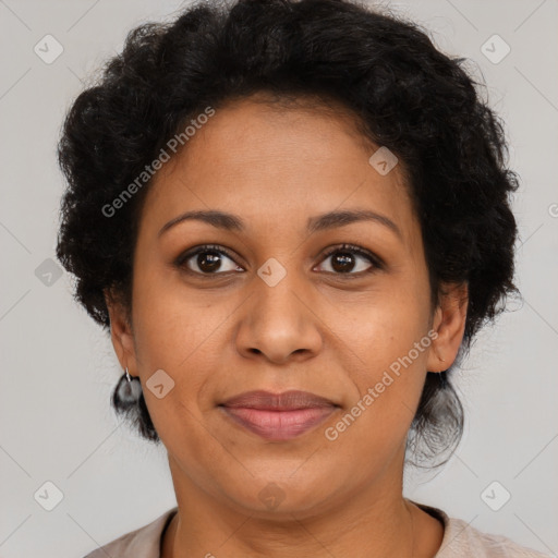 Joyful latino adult female with short  brown hair and brown eyes