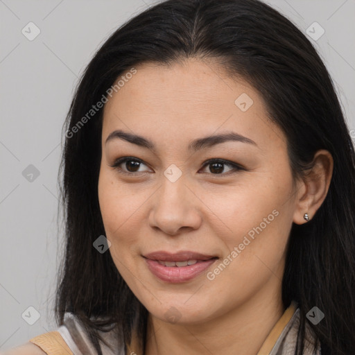 Joyful asian young-adult female with long  brown hair and brown eyes