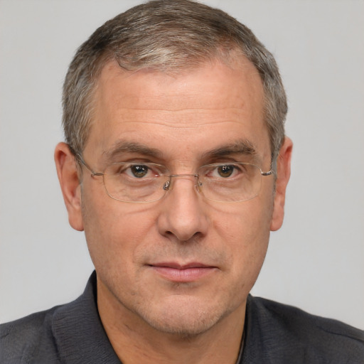 Neutral white middle-aged male with short  brown hair and brown eyes